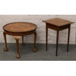 A mahogany occasional table and a bur walnut occasional table with scalloped top.