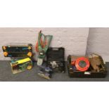 A quantity of motor driven hand tools to include Black and Decker alligator saw, Bosh sander,