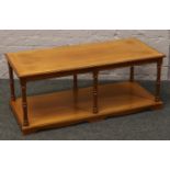 A two tier crossbanded mahogany coffee table.