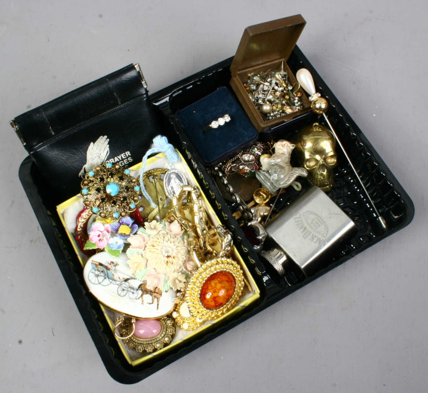A quantity of costume jewellery including dress ring, necklace, bracelet, brooches, hat pins etc.