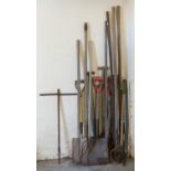 A good collection of garden tools to include pitch forks, Hoe's spades shovels, woodmans axe etc.