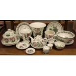 A large quantity of Portmeirion The Botanic Garden pattern to include vases, wall clock etc.