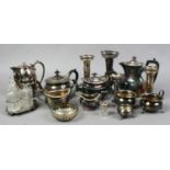 A collection of mixed silver plate including tea service cruet set and spill vases etc.