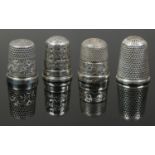 Four silver thimbles including Chester assayed Charles Horner example.