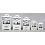 Five Dutch porcelain kitchen storage jars and covers decorated with landscapes.