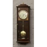 A mahogany cased eight day Westminster wall clock, Knight & Gibbons.