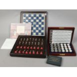 Franklin Mint The Battle of Waterloo chess set (with minor wear to the board) along with the cased