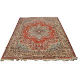 A rust ground wool carpet with medallion design, 3m x 2m.