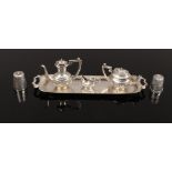 A silver dolls part teaset on serving tray assayed Birmingham 1963, along with two silver