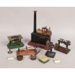 A tin plate line steam flat bed engine and quantity of tools.