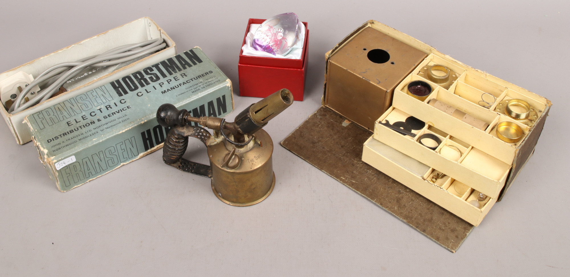 A group of collectables including a vintage boxed child's microscope set, boxed Fransen Horstman