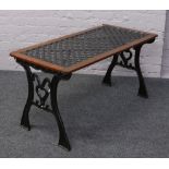 A painted cast iron garden table.