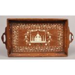 A twin handled Anglo - Indian style inlaid hardwood serving tray.