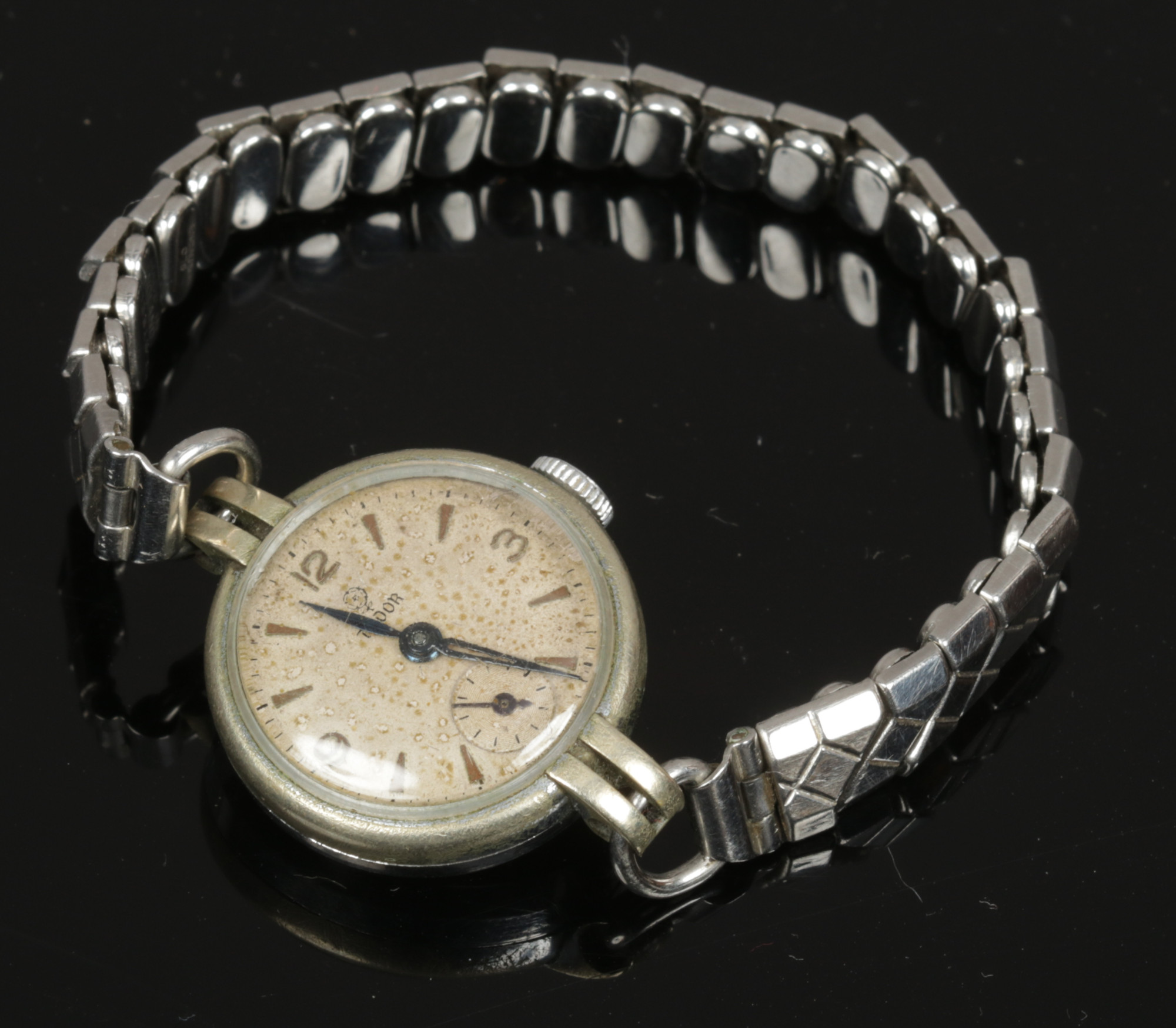 A ladies Tudor by Rolex bracelet watch with baton and Arabic numeral markers and subsidiary