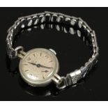 A ladies Tudor by Rolex bracelet watch with baton and Arabic numeral markers and subsidiary