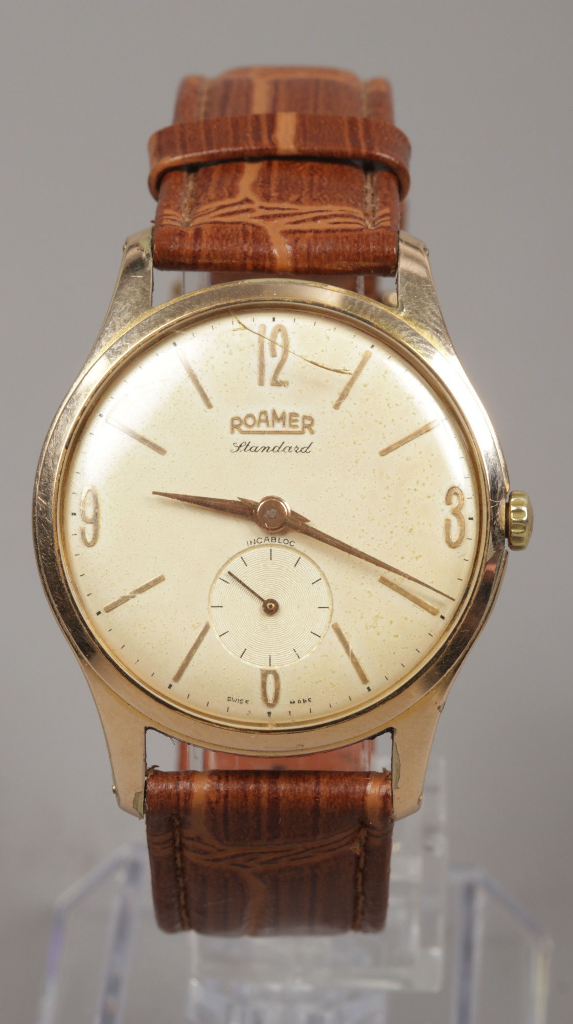 A gents Roamer standard manual gold plated wristwatch with baton and Arabic numeral markers and