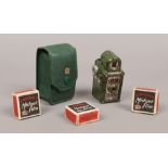 A rare 1930s Coronet midget green Bakelite 16mm spy camera in original green leather case, along