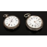 Two silver cased fob watches both with white enamel dials one with subsidiary seconds.