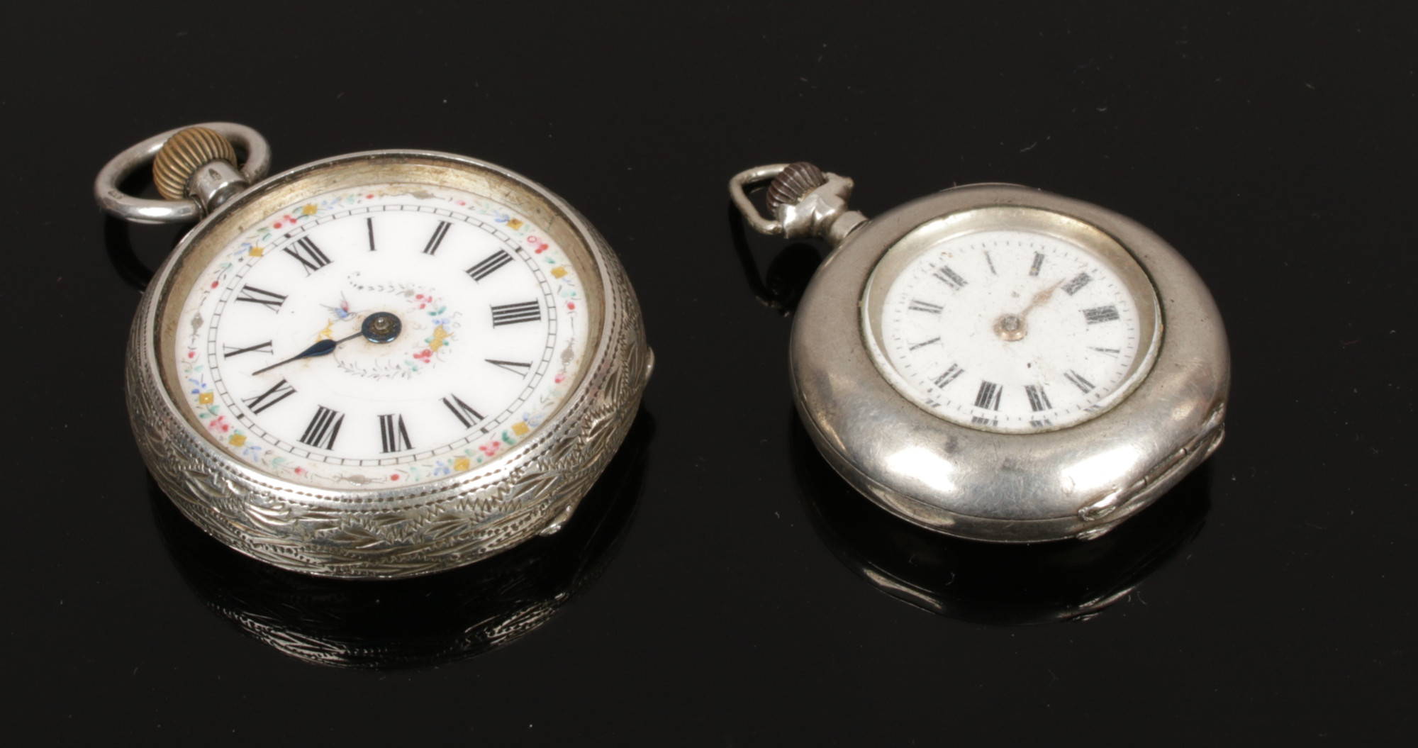 Two silver cased fob watches both having white enamel dials. Condition report intended as a guide