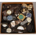 A small box of vintage wristwatches a pocket watch and two desk clocks, spares or repair.