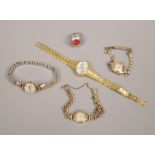 Three ladies vintage gold plated / gilt wristwatches and a Buler ring watch.