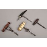 Four vintage cork screws to include bone handled examples.