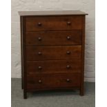 A mahogany chest of five drawers.