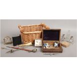 A basket of collectables letter openers, hip flask, cufflinks, candlestick etc.