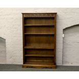 An Old Charm carved oak open bookcase.