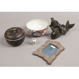 A Japanese bronze model of Kinko riding a carp, an Imari fluted bowl, a lacquered metal bowl,