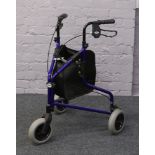 A Days Patterson medical folding mobility walker model No. 240L.