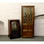 A lead glazed oak priory corner cupboard, along with a lead glazed oak hi-fi cabinet.