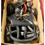A box lot of photographic equipment Tamron Adaptall zoom lenses, Praktica 35mm SLR, carry bag etc.