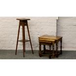 A nest of three carved oak tables, along with an Edwardian two tier plantstand.