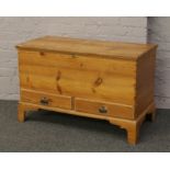 A pine mule chest with two drawers, for restoration.