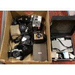 A box of cameras to include Olympus, Minolta, Polaroid, Kodak etc.