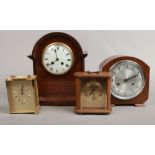 A mahogany cased dome top mantle clock with French movement along with a similar British example and