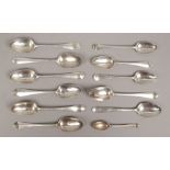 Twelve picture back silver spoons, weight 114 grams.