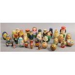 A collection of Russian stacking dolls, along with similar examples.