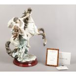 A large limited edition original Giuseppe Armani figure group formed as an embracing couple on