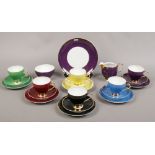 A Farolina porcelain part coffee set in multiple colour grounds and with gilt decoration including