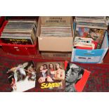 Three boxes of L.P and single records to include The Beatles, The Rolling Stones, Bob Dylan etc.