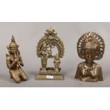 An antique bronze figure of two deities and two similar.