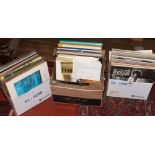 Three boxes of L.P records to include rock, pop, easy listening and classical.