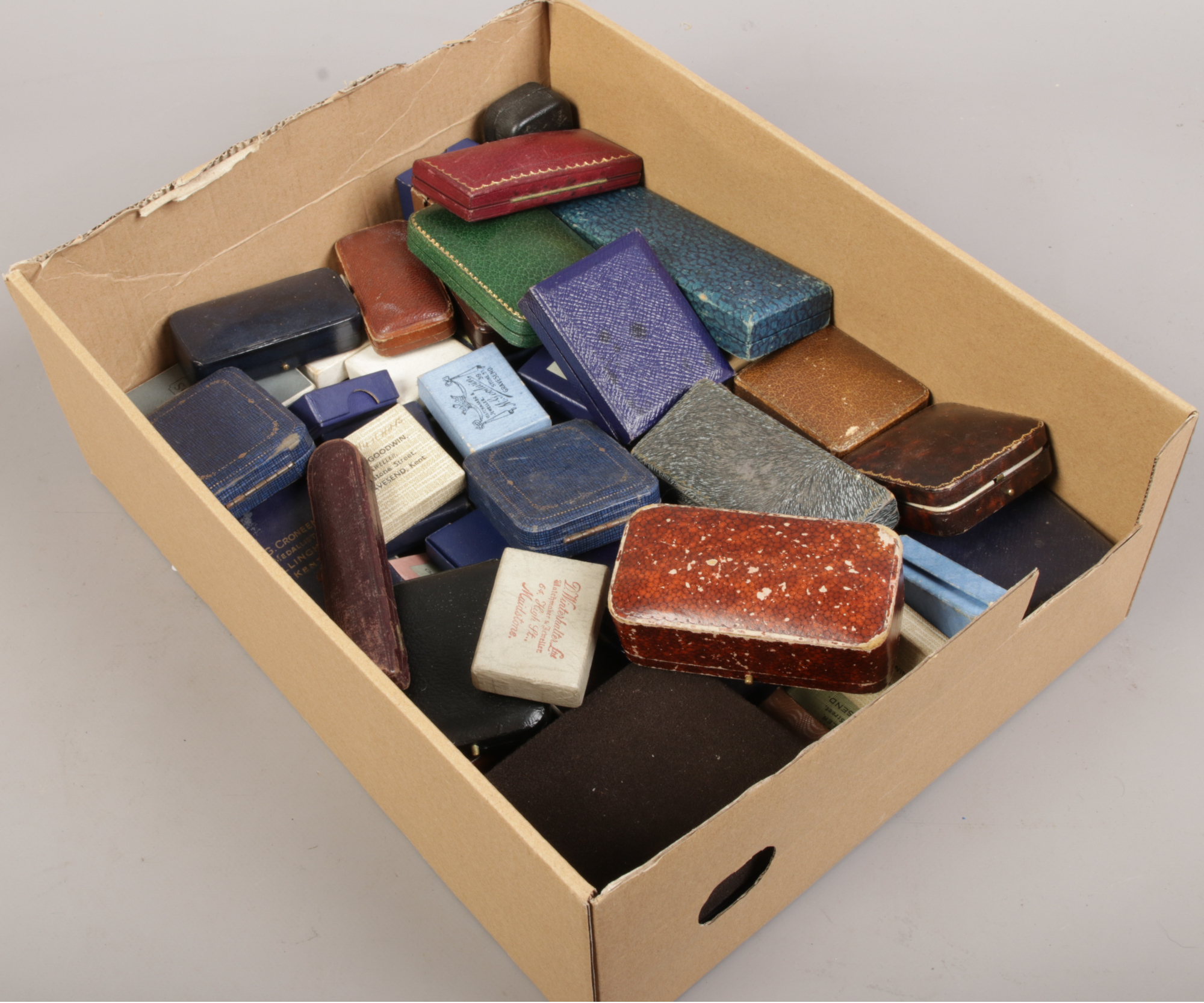 A box of antique and vintage jewellery boxes.