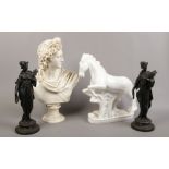 A group lot including a pair of spelter figures, composite bust of Apollo, ceramic rearing horse