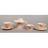 A Newport pottery Clarice Cliff daffodil shape part tea set in the Damask Rose pattern, comprising