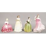 Four Royal Doulton figures of ladies.