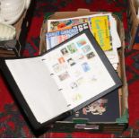 Two albums and a large quantity of sheets of world stamps.