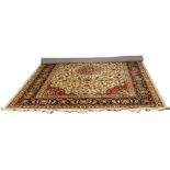 A beige ground Keshan rug with medallion design, 2.8m x 2m.